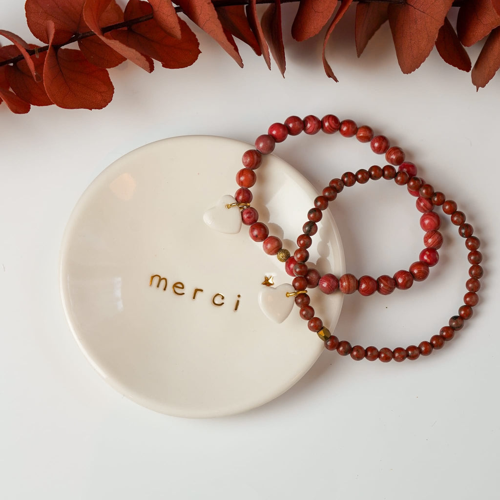 coupelle à bijoux en porcelaine blanche avec inscription merci et étoile dorée